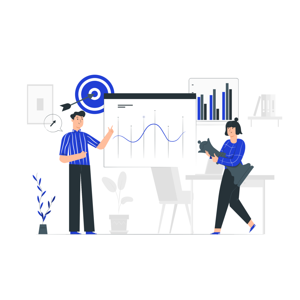 Una imagen de dos personas en un entorno de oficina. Una persona, a la izquierda, está señalando un gráfico de líneas en una pantalla grande. Esta persona lleva una camisa a rayas azules. La otra persona, a la derecha, está sentada en un escritorio, sosteniendo un cojín. Ella lleva una camisa de cuadros azules. Al fondo, hay gráficos de barras y una diana, así como una estantería con carpetas. También hay plantas decorativas en la escena.